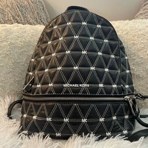 Michael Kors Quilted Leather Medium backpack purse.
